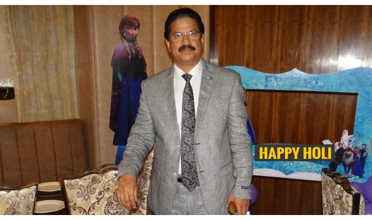 K.K Gupta extends Holi greetings